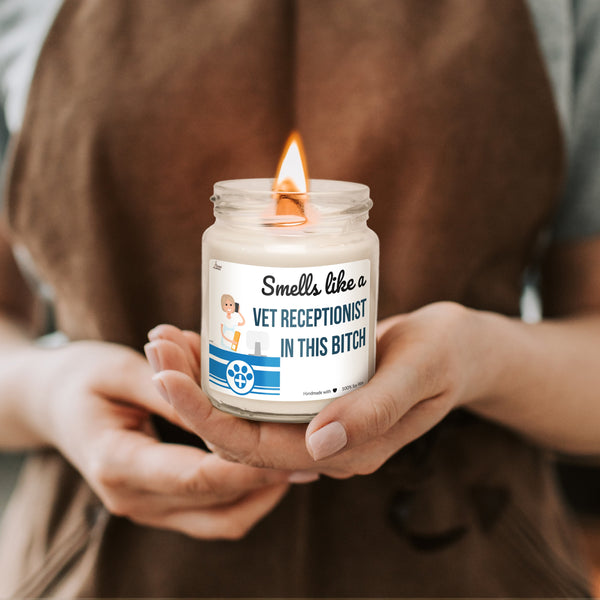 a woman holding a candle in her hands