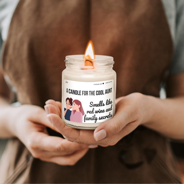 a woman holding a candle in her hands