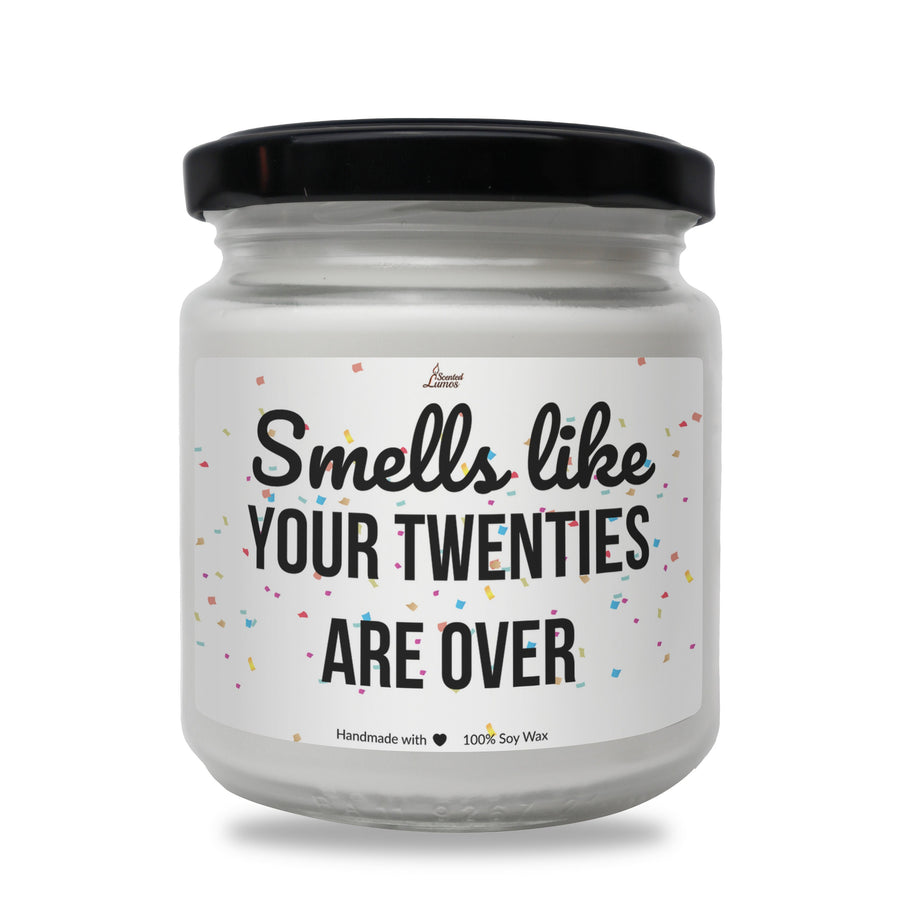 a jar of white candles that says smell like your twenties are over