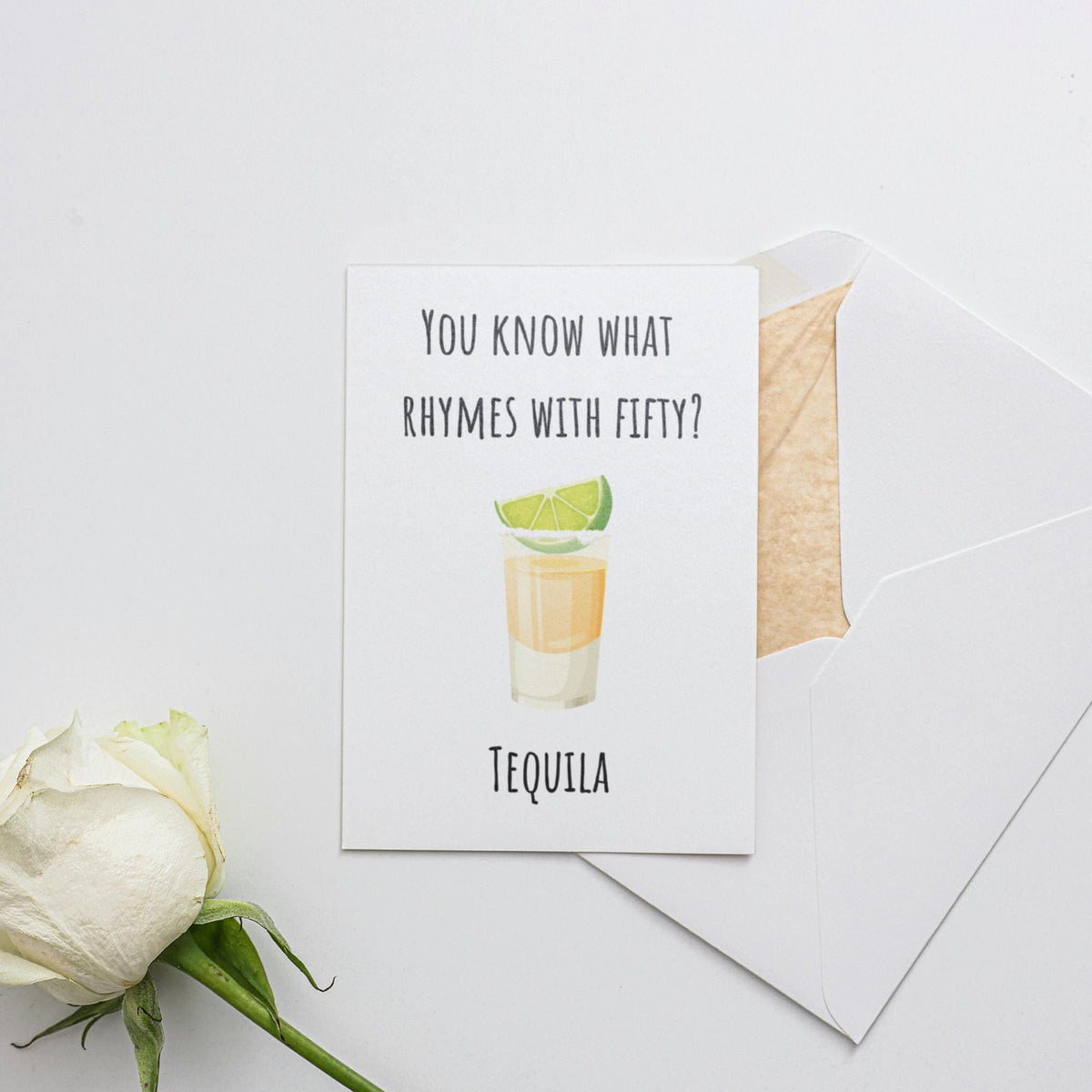 a card with a picture of a drink and a flower