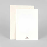 a blank card with a white envelope